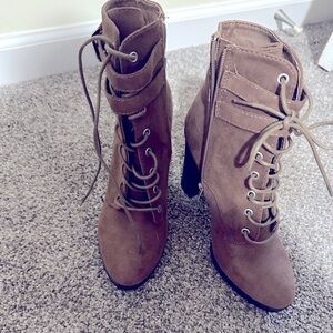 Never worn heeled boot